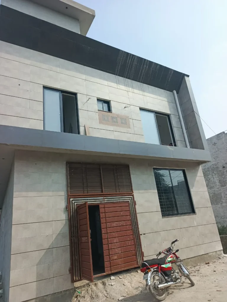 Close view of black aluminum sliding windows at Hazari Colony Bedian Road