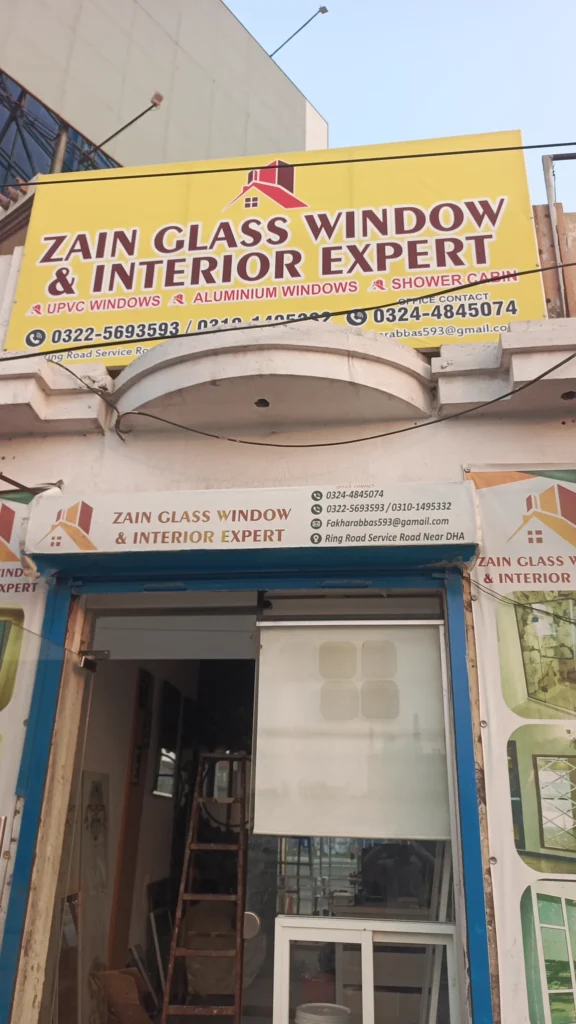 Zain Glass showroom signboard on Ext. Ring Road near DHA Phase 5 Lahore